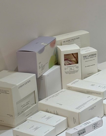 Stacked boxes of curated gel products
